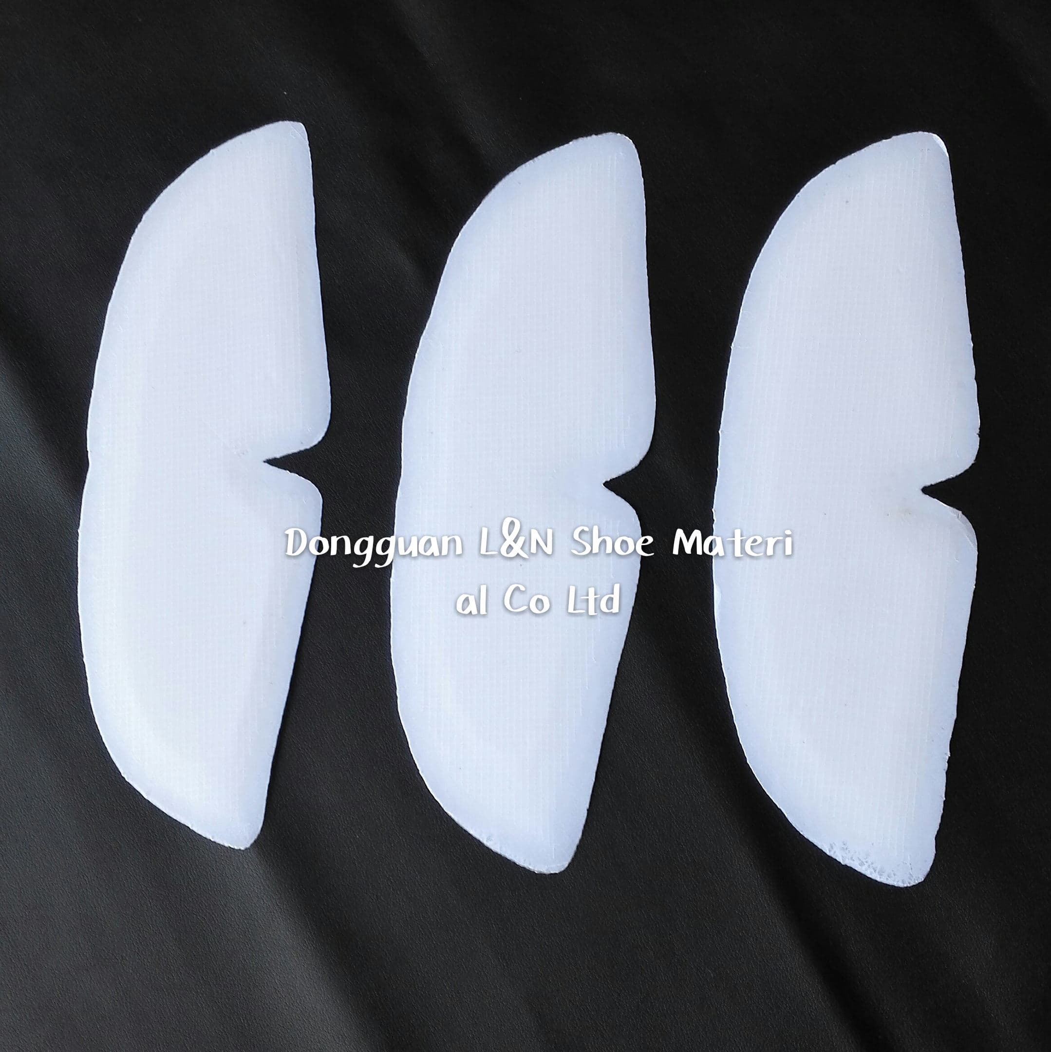 Thermoplastic shoe toe puffs and counters material